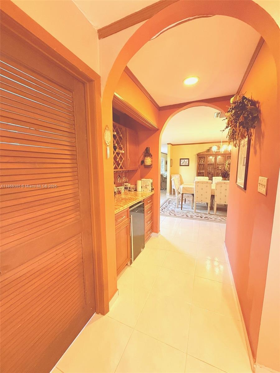 18901 Southwest 53rd Street Southwest Ranches, FL 33332 - Photo 13 of 24 a bedroom with a bed and a view of bathroom