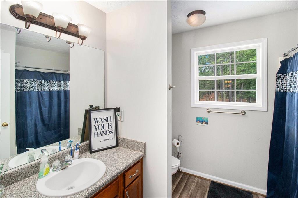 23 Erskine Road Monticello, GA 31064 - Photo 21 of 38 a bathroom with a sink a toilet and shower
