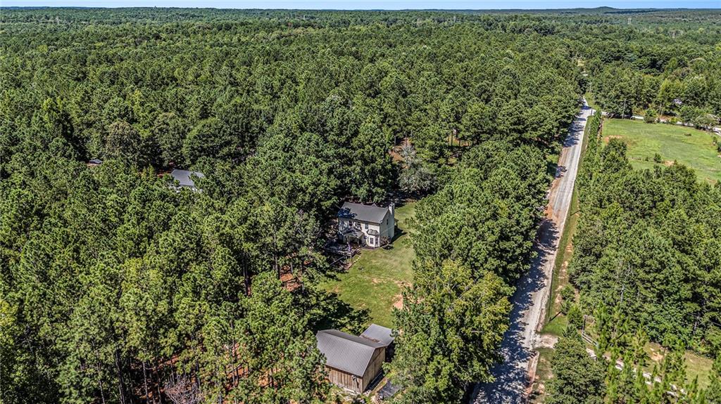 23 Erskine Road Monticello, GA 31064 - Photo 37 of 38 an aerial view of a house with a yard