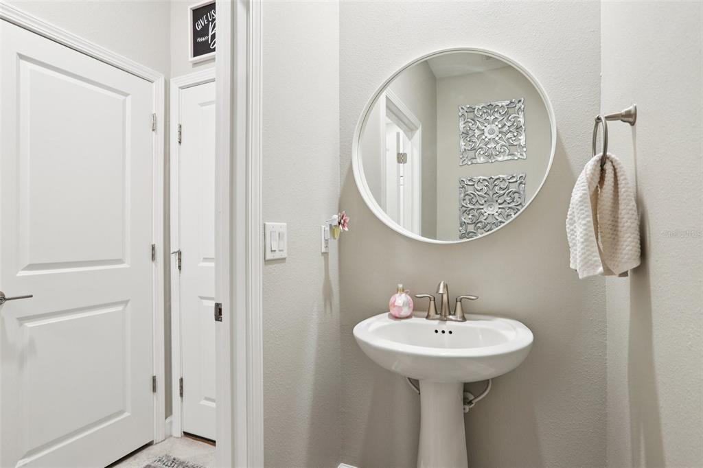 1306 White Fox Run Lutz, FL 33549 - Photo 15 of 35 a bathroom with a sink and a mirror