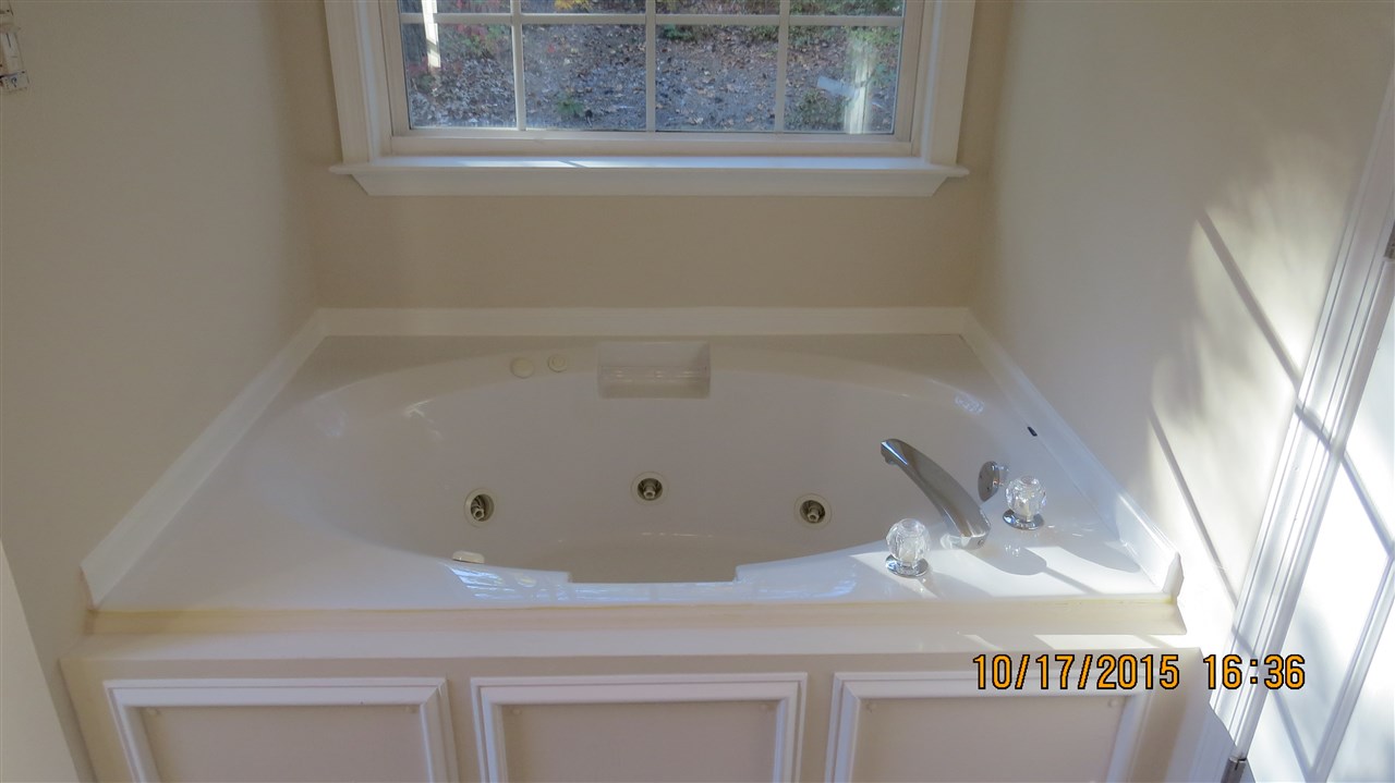 15 Stonefield Road Palmyra, VA 22963 - Photo 12 of 15 a bathroom with a bathtub