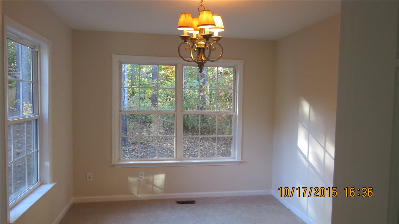 15 Stonefield Road Palmyra, VA 22963 - Photo 9 of 15 a bathroom with a chandelier fan and a window