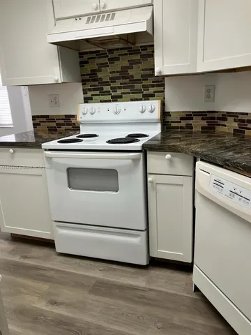 $1,975 | 2837 North Course Drive, Unit 103, Pompano Beach, FL 33069