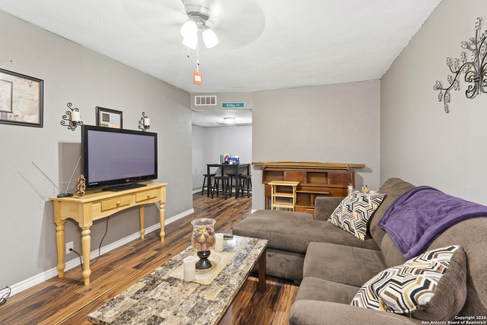 3122 Culebra Road, Unit 104 San Antonio, TX 78228 - Photo 2 of 14 a living room with furniture and a flat screen tv