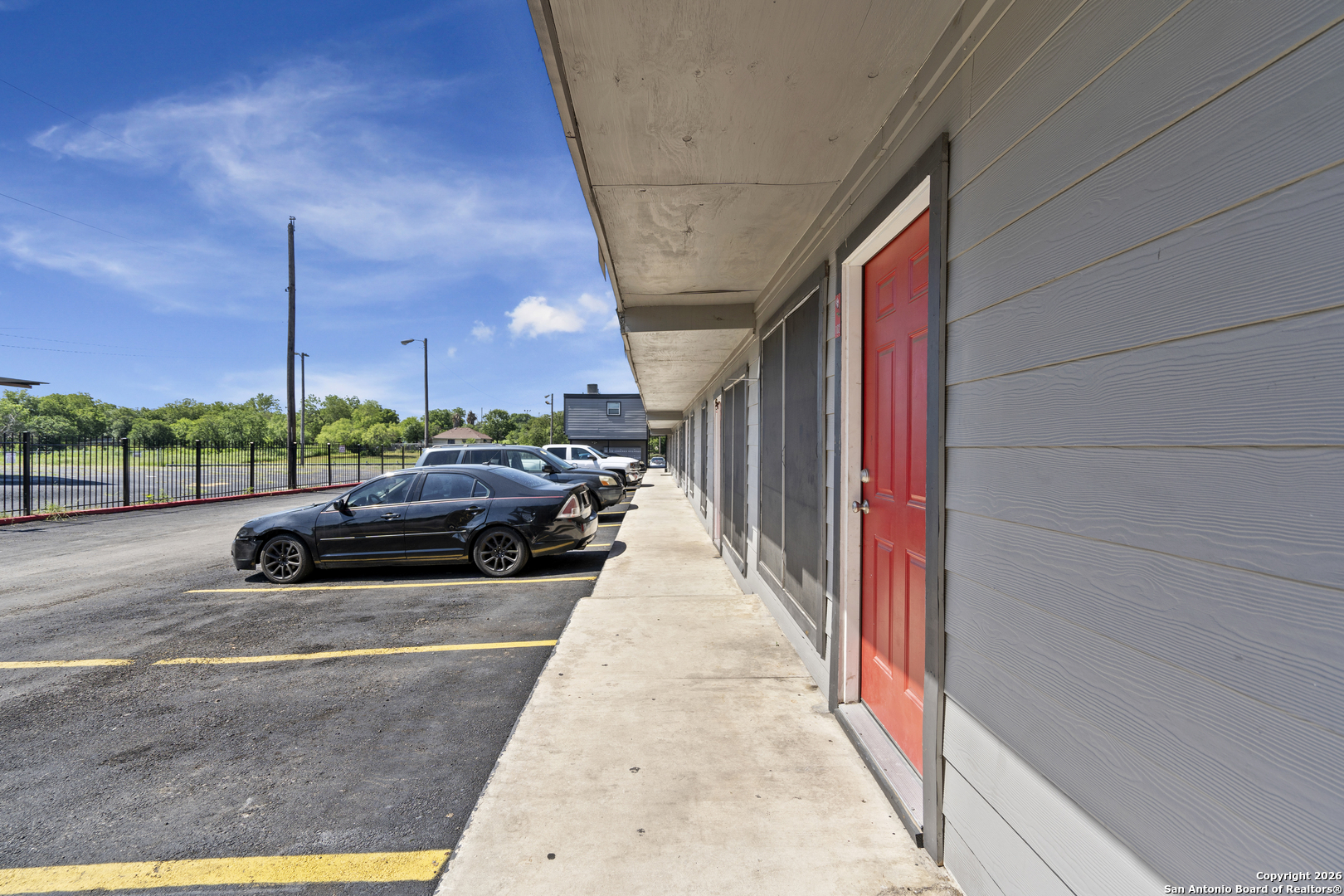 3122 Culebra Road, Unit 104 San Antonio, TX 78228 - Photo 10 of 14 a view of a balcony with car parked