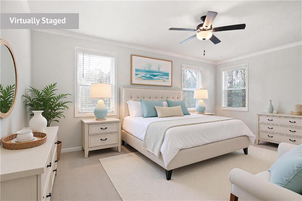 764 Clifftop Crossing Southwest Powder Springs, GA 30127 - Photo 25 of 38 a bedroom with a bed and a couch