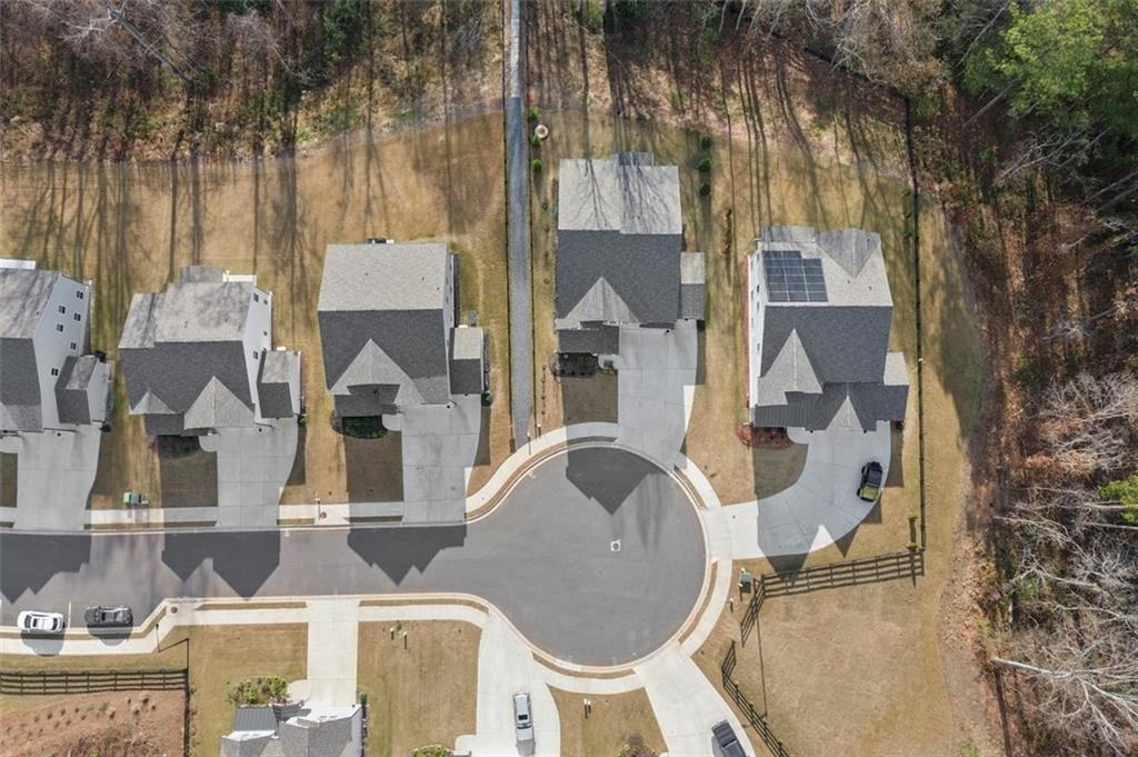 764 Clifftop Crossing Southwest Powder Springs, GA 30127 - Photo 38 of 38 a front view of a house with outdoor seating