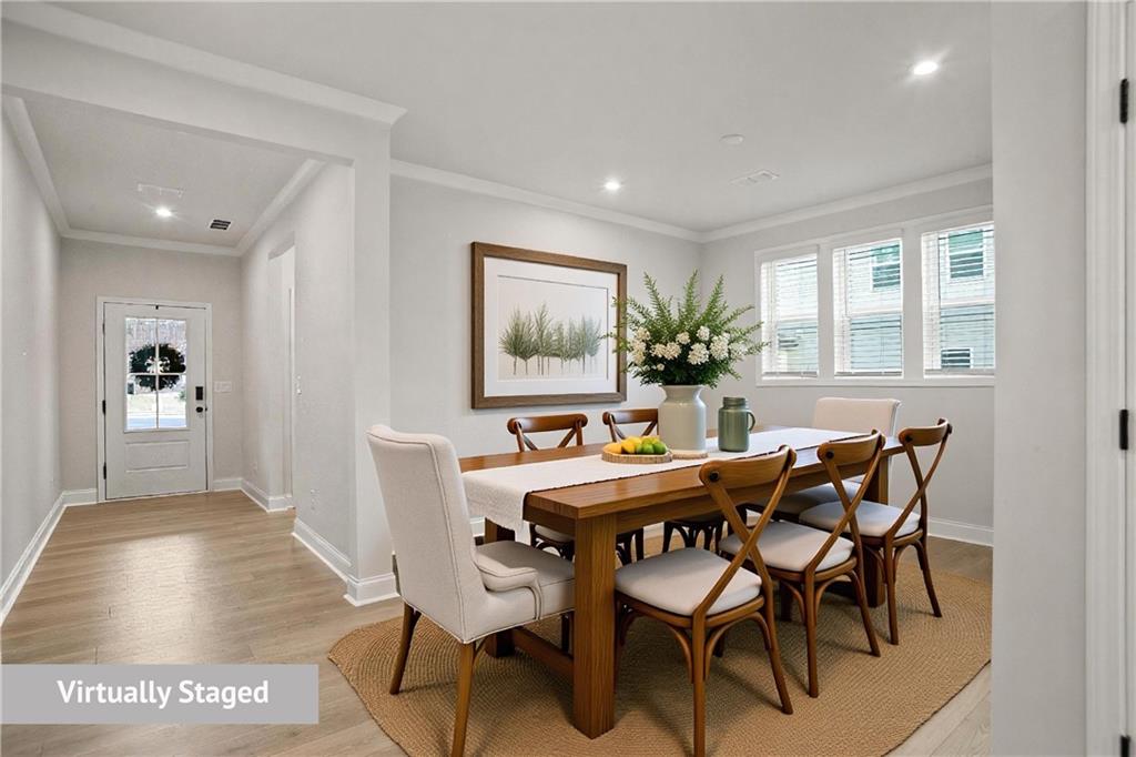 764 Clifftop Crossing Southwest Powder Springs, GA 30127 - Photo 4 of 38 a view of a dining room with furniture and window
