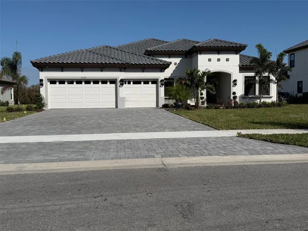 front view of a house with a street