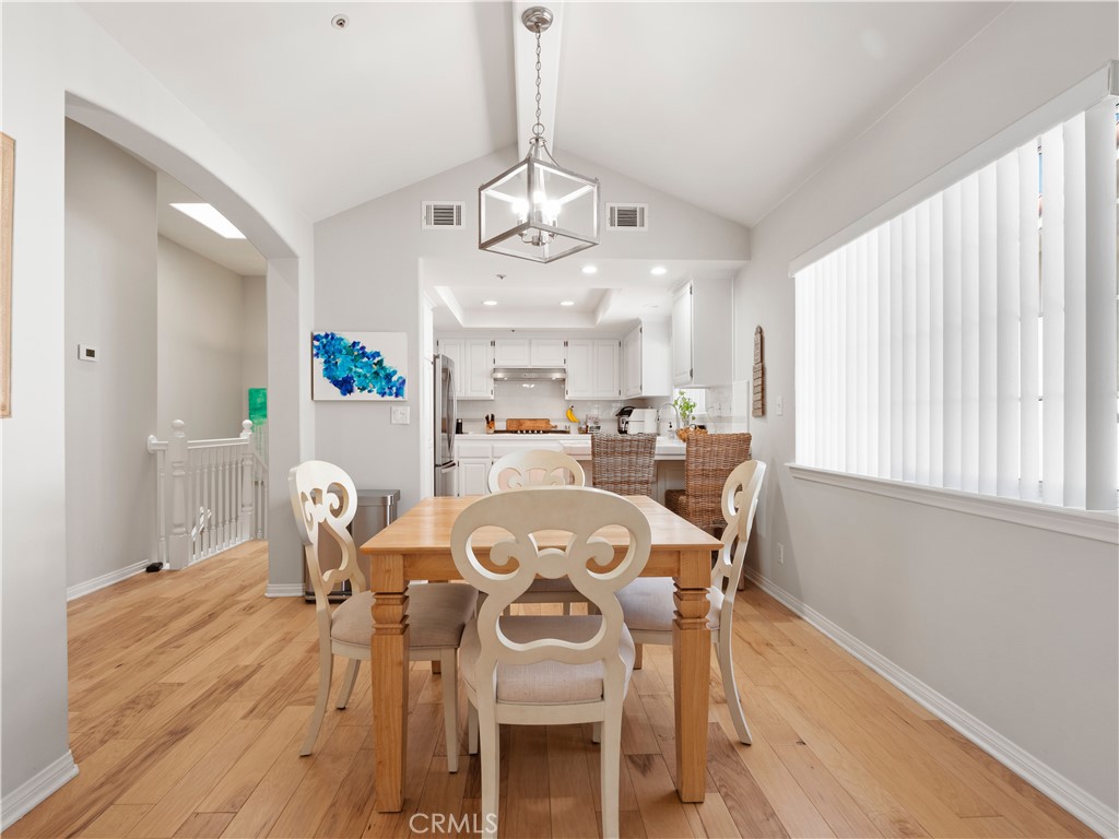 2517 Rockefeller Lane, Unit B Redondo Beach, CA 90278 - Photo 5 of 36 a view of a dining room with furniture window and wooden floor