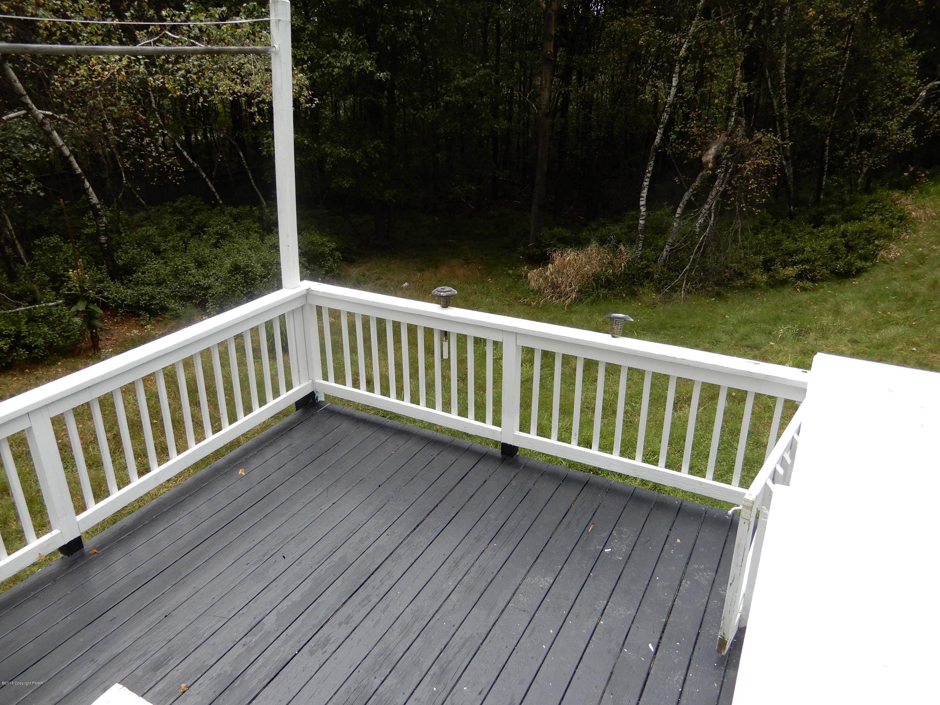 251 Sage Road Long Pond, PA 18334 - Photo 36 of 37 Lower Deck