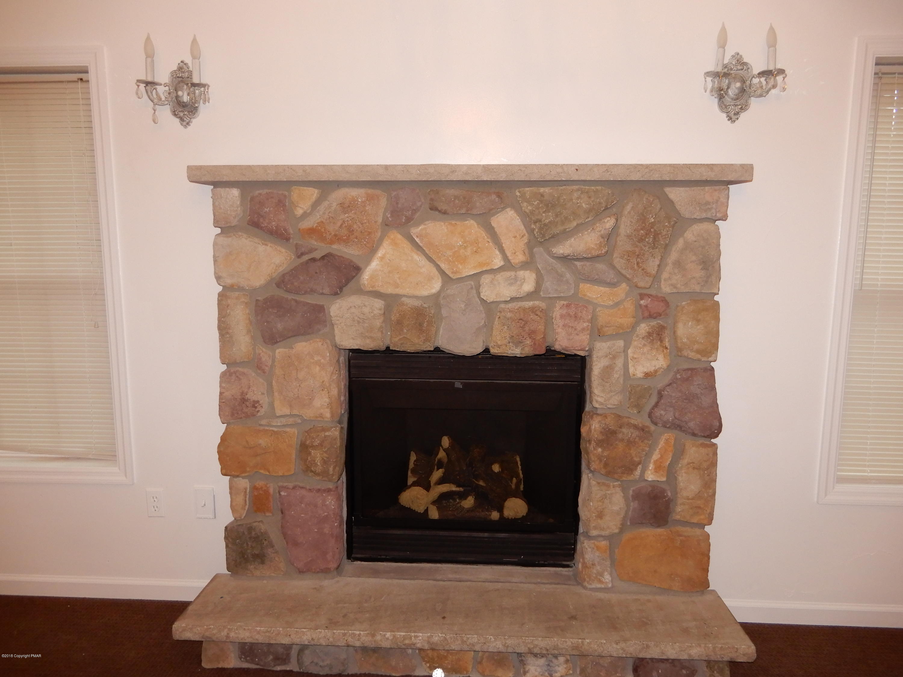 251 Sage Road Long Pond, PA 18334 - Photo 9 of 37 Living Room Stone Gas Fireplace