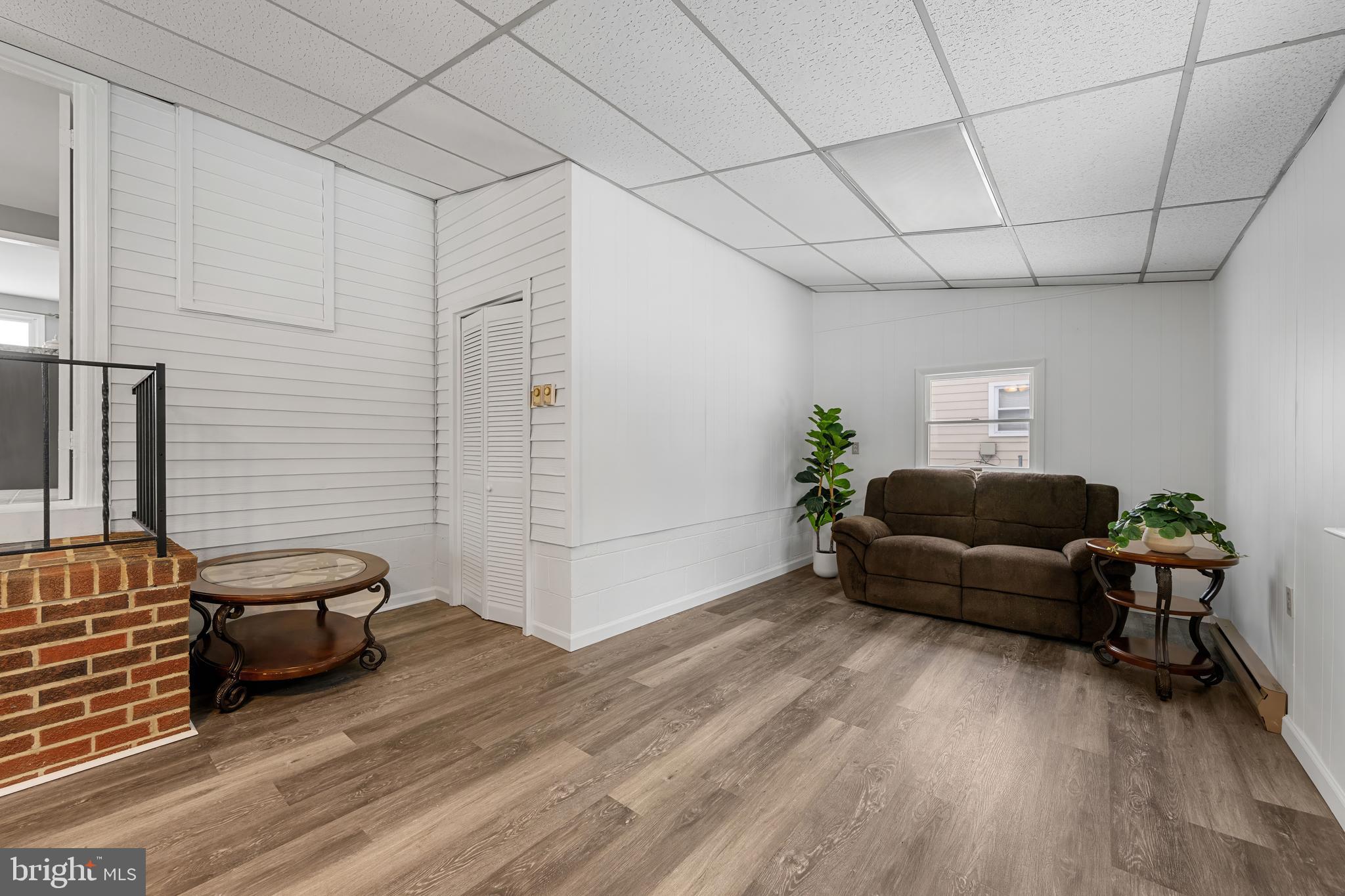 911 Homberg Avenue Baltimore, MD 21221 - Photo 14 of 28 a living room with furniture and wooden floor