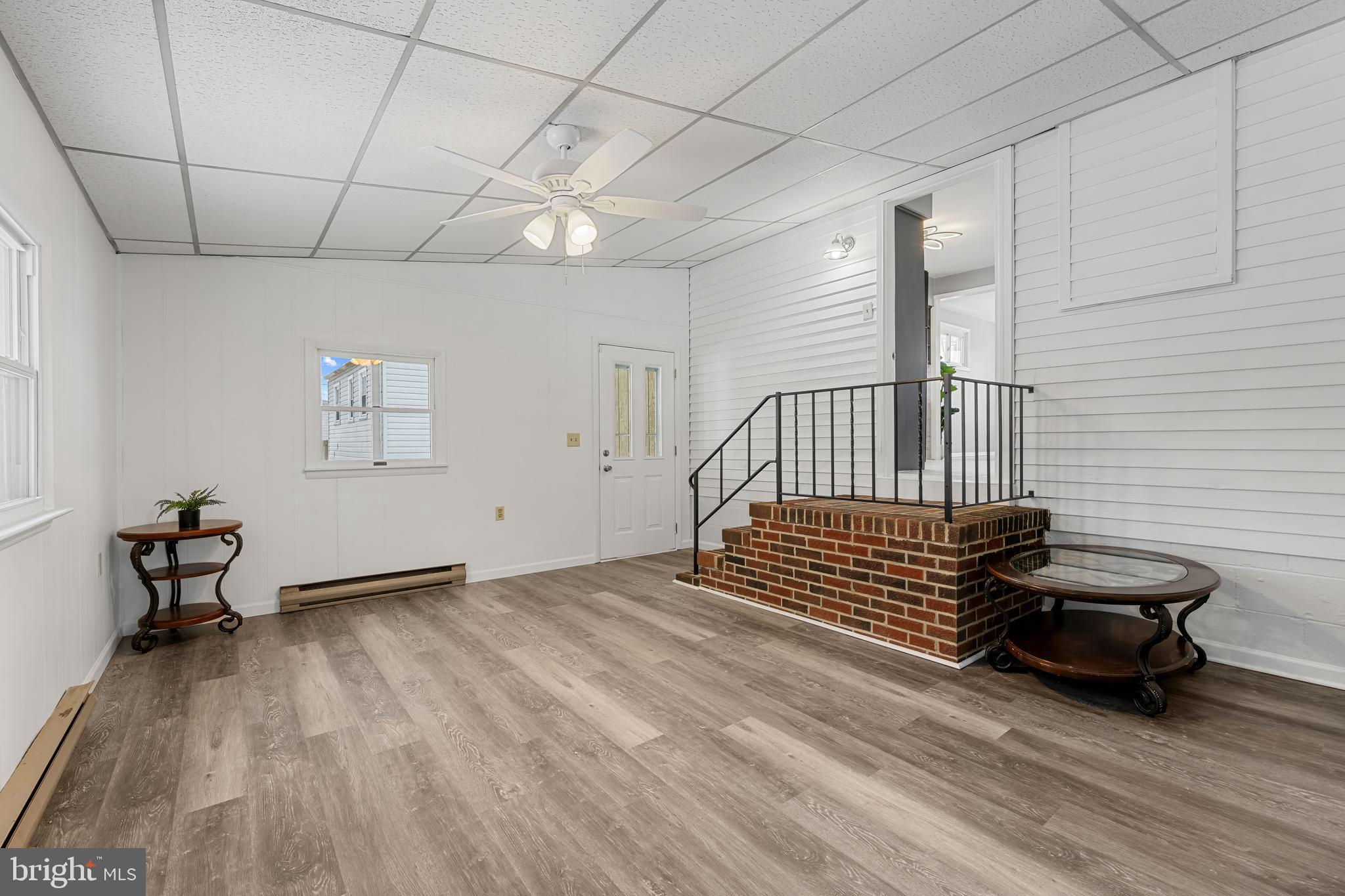 911 Homberg Avenue Baltimore, MD 21221 - Photo 15 of 28 a view of livingroom with furniture and wooden floor