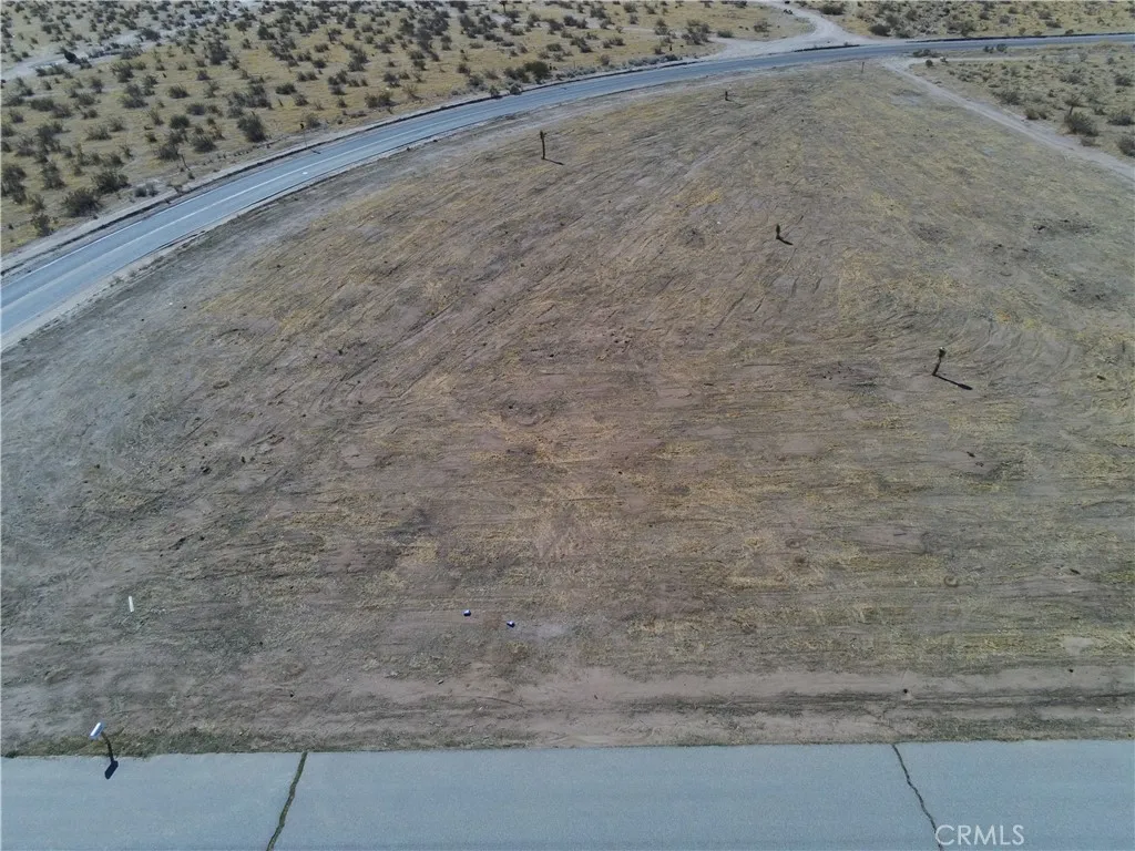 0 Mariposa Road San Clemente, CA 92672 - Photo 7 of 7 a view of a dry yard with wooden fence