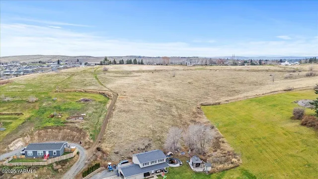 a view of a lake with a yard