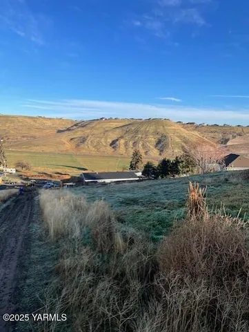 a view of an ocean and a mountain