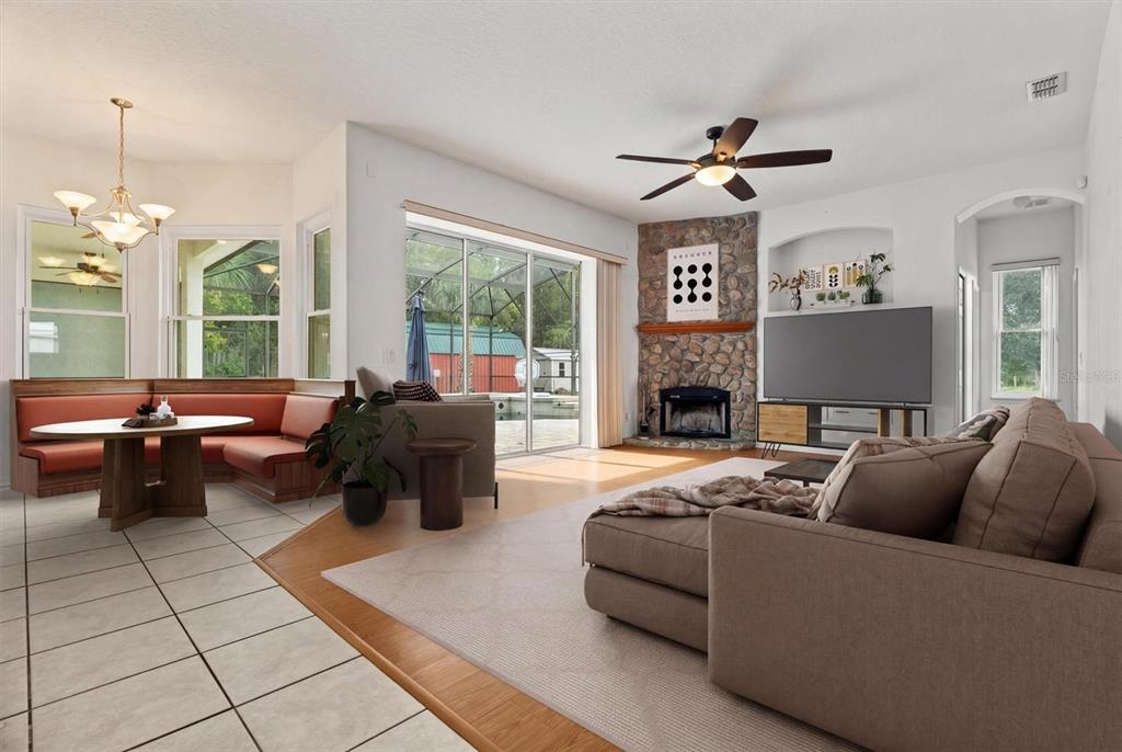 20744 Sheldon Street Orlando, FL 32833 - Photo 14 of 50 a living room with furniture fireplace and a large window
