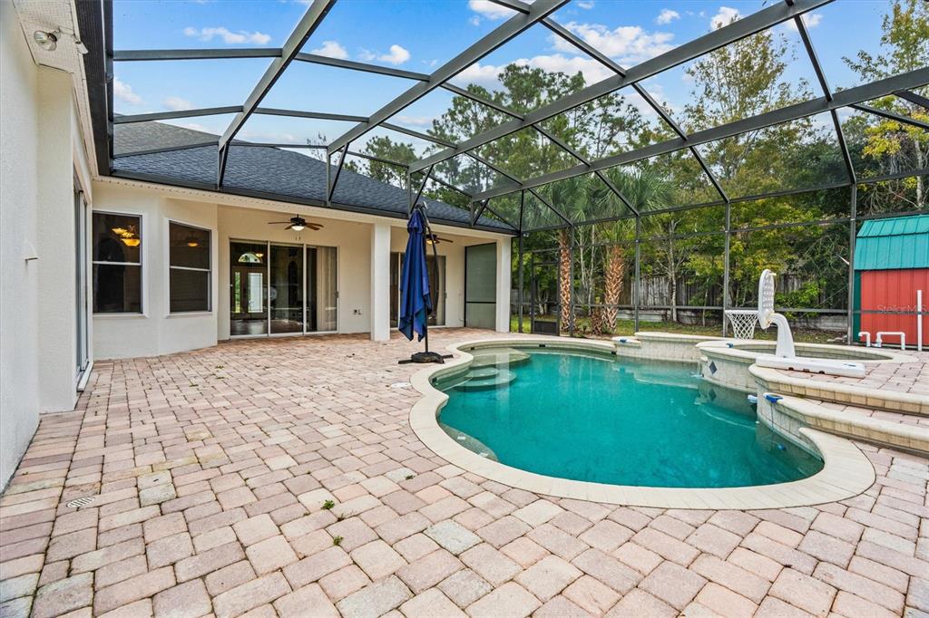 20744 Sheldon Street Orlando, FL 32833 - Photo 30 of 50 a view of a swimming pool with a sitting space