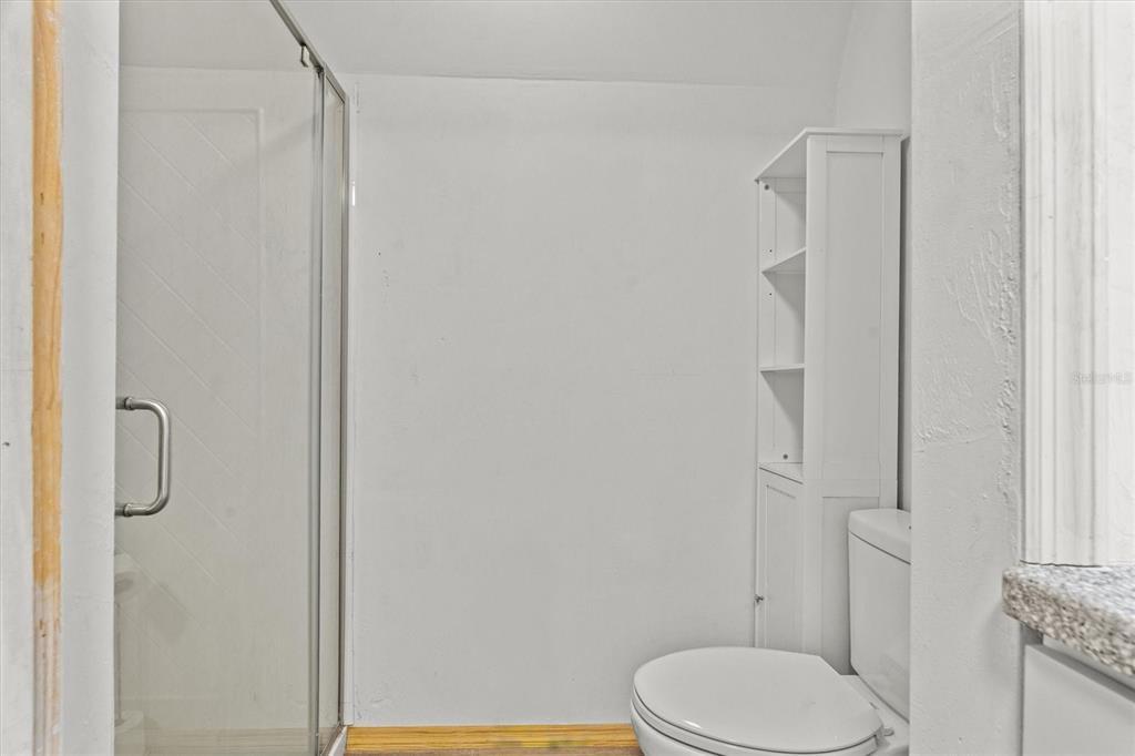 20744 Sheldon Street Orlando, FL 32833 - Photo 40 of 50 a white toilet sitting next to a bathroom sink