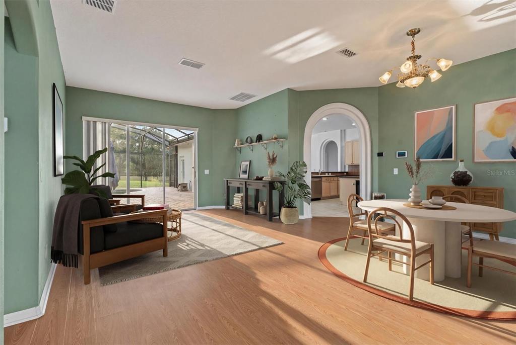 20744 Sheldon Street Orlando, FL 32833 - Photo 6 of 50 a living room with fireplace furniture and a large window