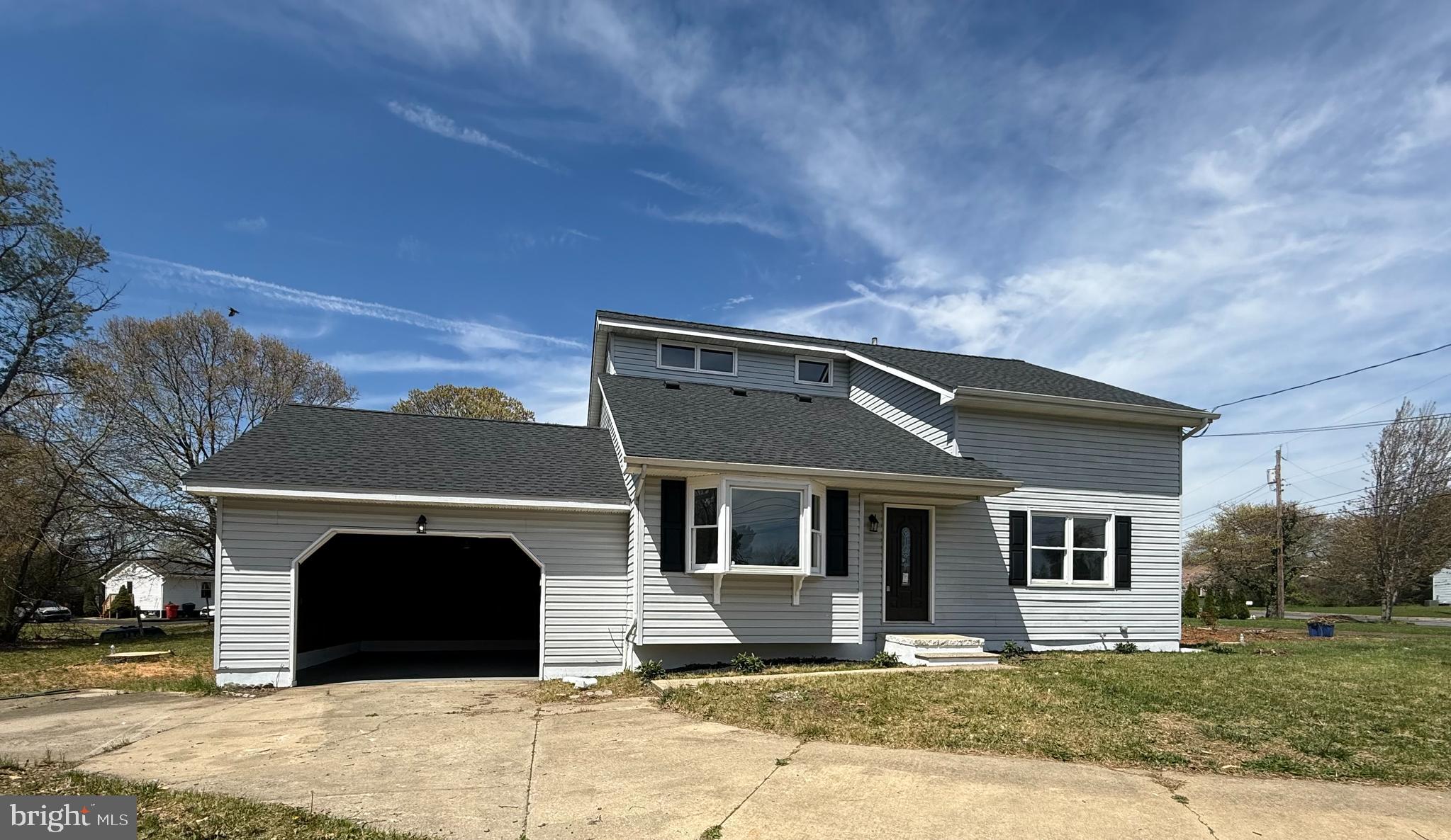 82 Dare Avenue Bridgeton, NJ 08302 - Photo 1 of 39 a front view of a house with a yard