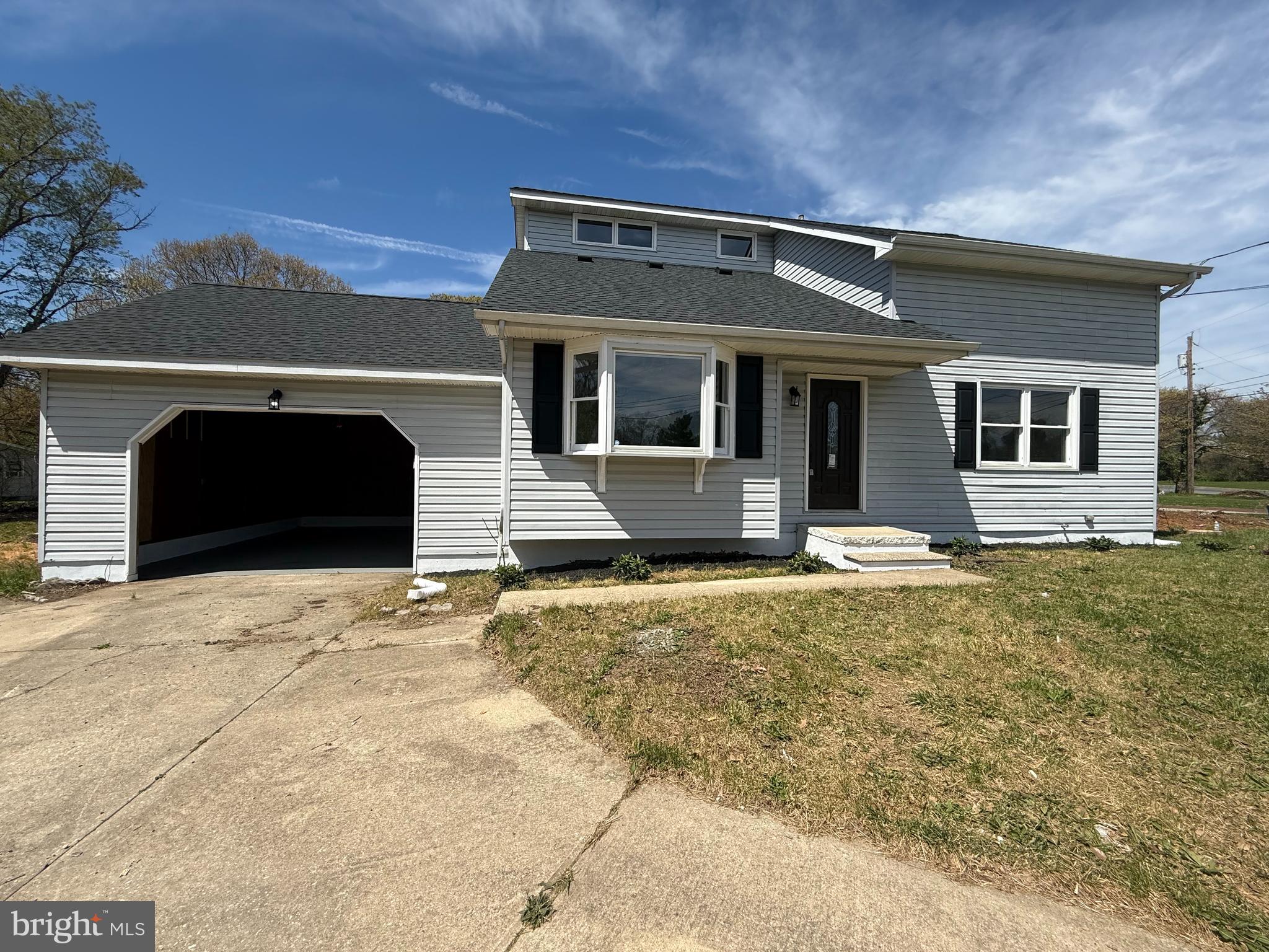 82 Dare Avenue Bridgeton, NJ 08302 - Photo 4 of 39 a front view of a house with yard
