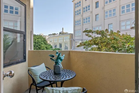 a view of balcony with a potted plant