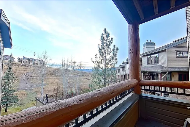 a view of balcony with furniture