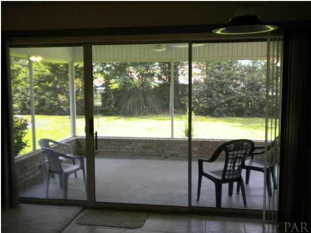 2247 Cricket Ridge Drive Cantonment, FL 32533 - Photo 11 of 25 View of Screened Porch From Kitchen