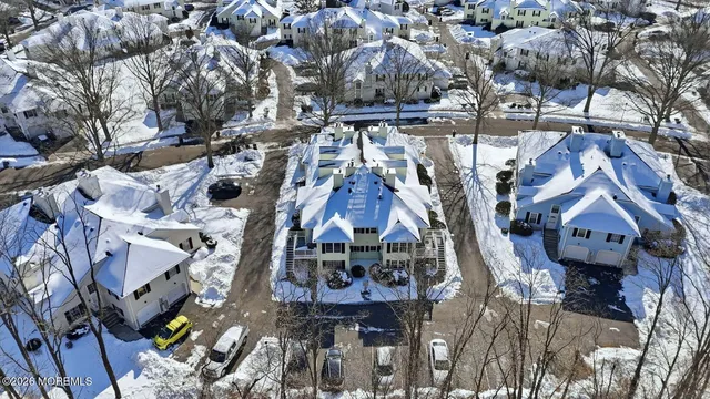 a picture of a room with a floor and a white wall