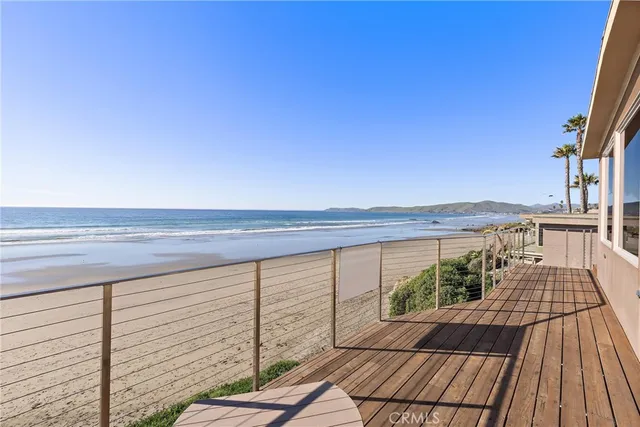 a view of balcony with furniture