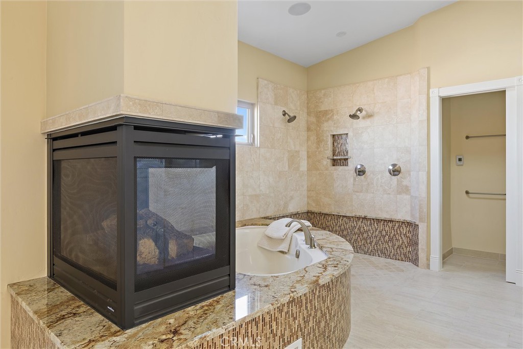 3352 Studio Drive Cayucos, CA 93430 - Photo 24 of 55 a bathroom with a tub and shower