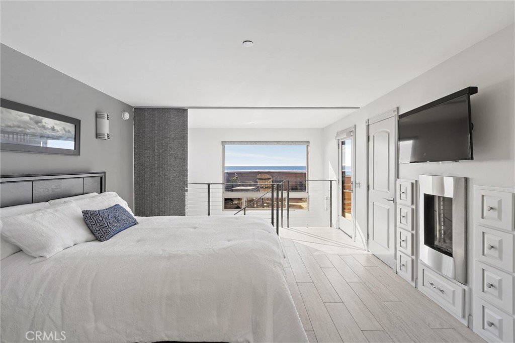 3352 Studio Drive Cayucos, CA 93430 - Photo 29 of 55 a bedroom with a bed and a flat screen tv