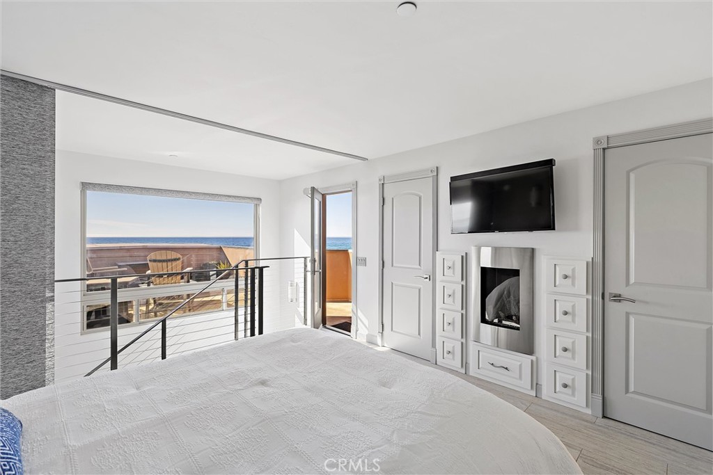 3352 Studio Drive Cayucos, CA 93430 - Photo 31 of 55 a view of a livingroom with furniture fireplace and a window