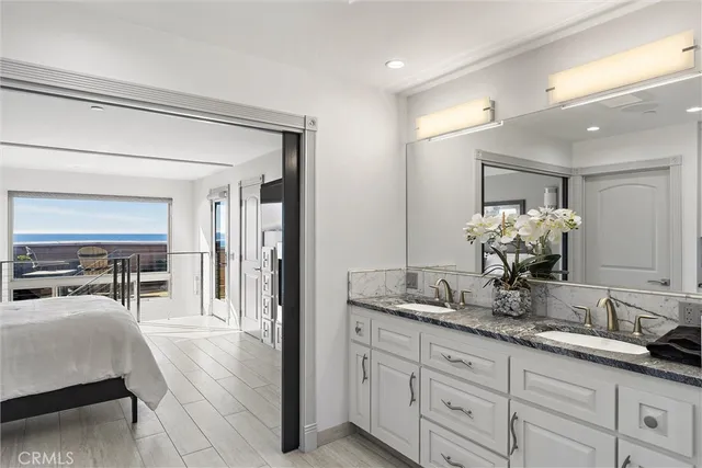 a bathroom with a tub sink and shower