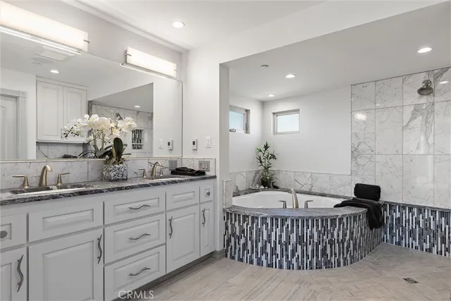 a view of swimming pool with furniture