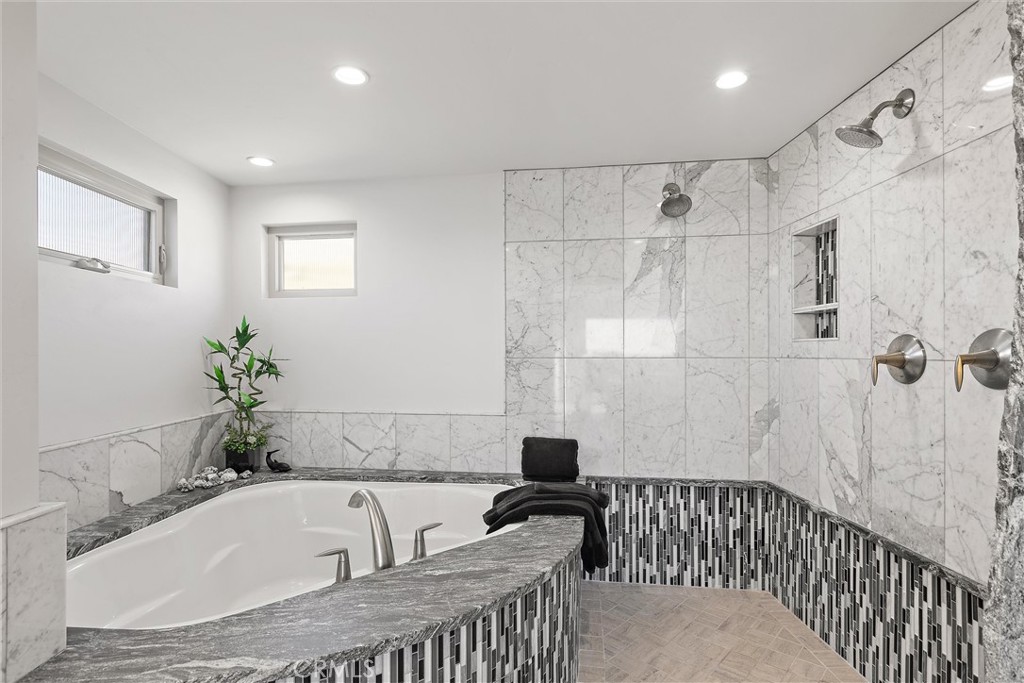 3352 Studio Drive Cayucos, CA 93430 - Photo 34 of 55 a bathroom with a tub sink and shower