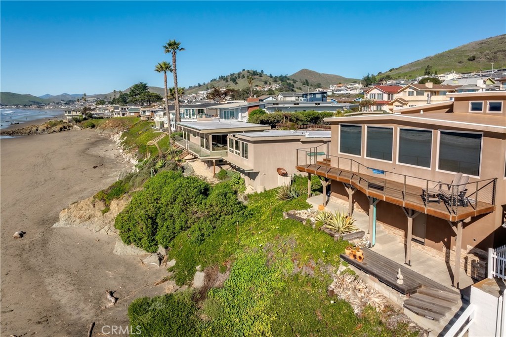 3352 Studio Drive Cayucos, CA 93430 - Photo 43 of 55 a aerial view of a house with a yard and lake view
