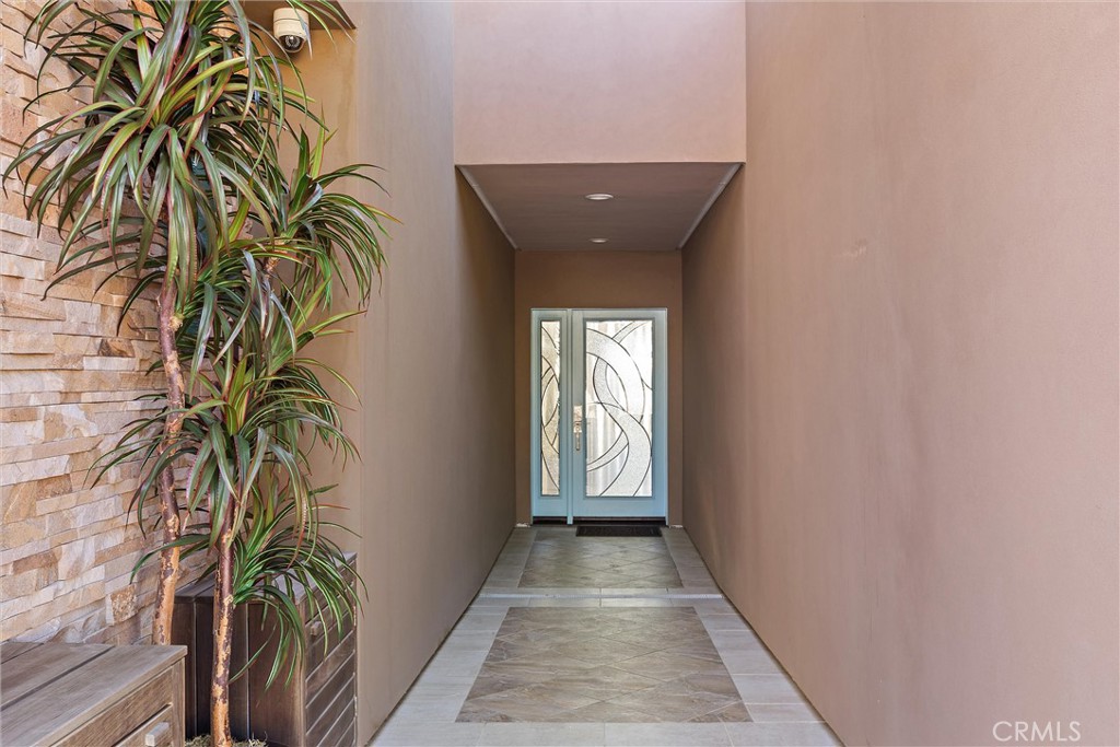3352 Studio Drive Cayucos, CA 93430 - Photo 47 of 55 a view of a hallway with potted plants