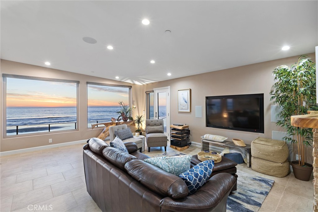 3352 Studio Drive Cayucos, CA 93430 - Photo 8 of 55 a living room with furniture and a flat screen tv