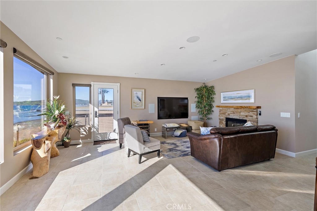 3352 Studio Drive Cayucos, CA 93430 - Photo 55 of 55 a living room with furniture and a flat screen tv