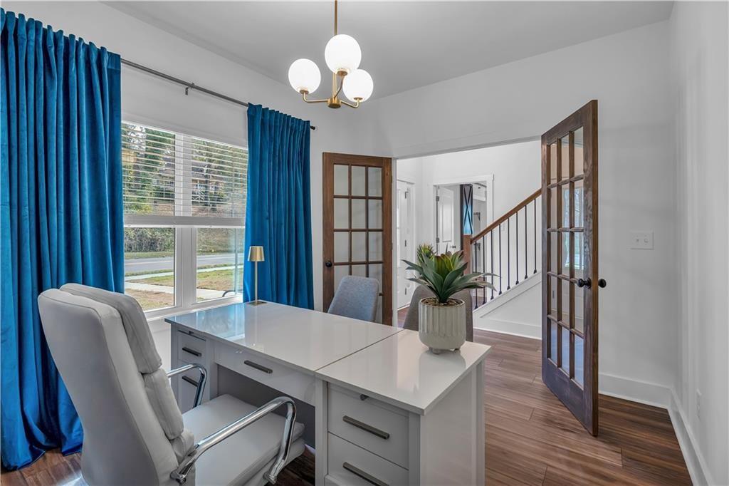 44 Puckett Road Emerson, GA 30137 - Photo 5 of 38 a view of a dining room with furniture window and wooden floor