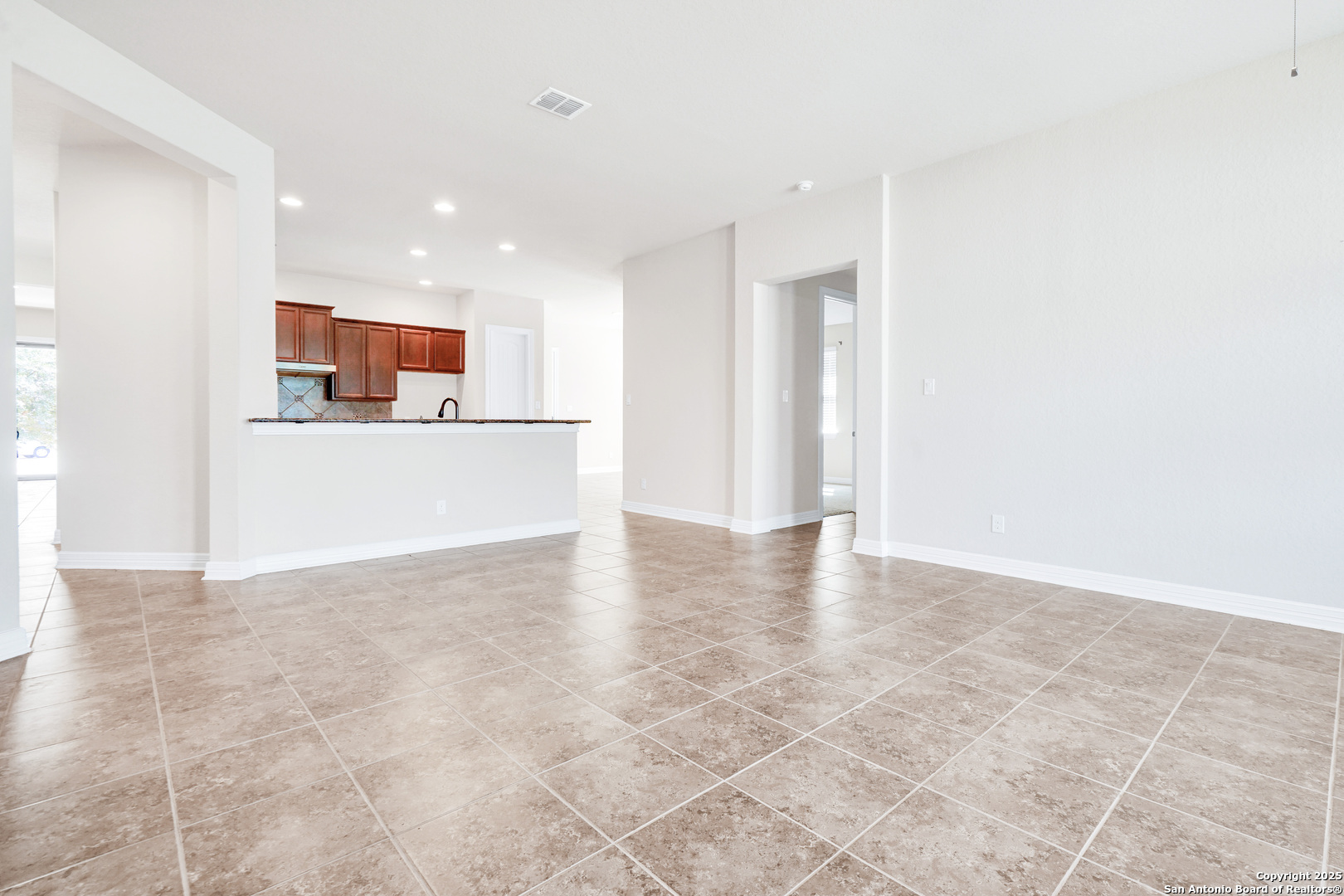 11923 Hollering Pass Schertz, TX 78154 - Photo 17 of 43 a view of kitchen and kitchen with stainless steel appliances