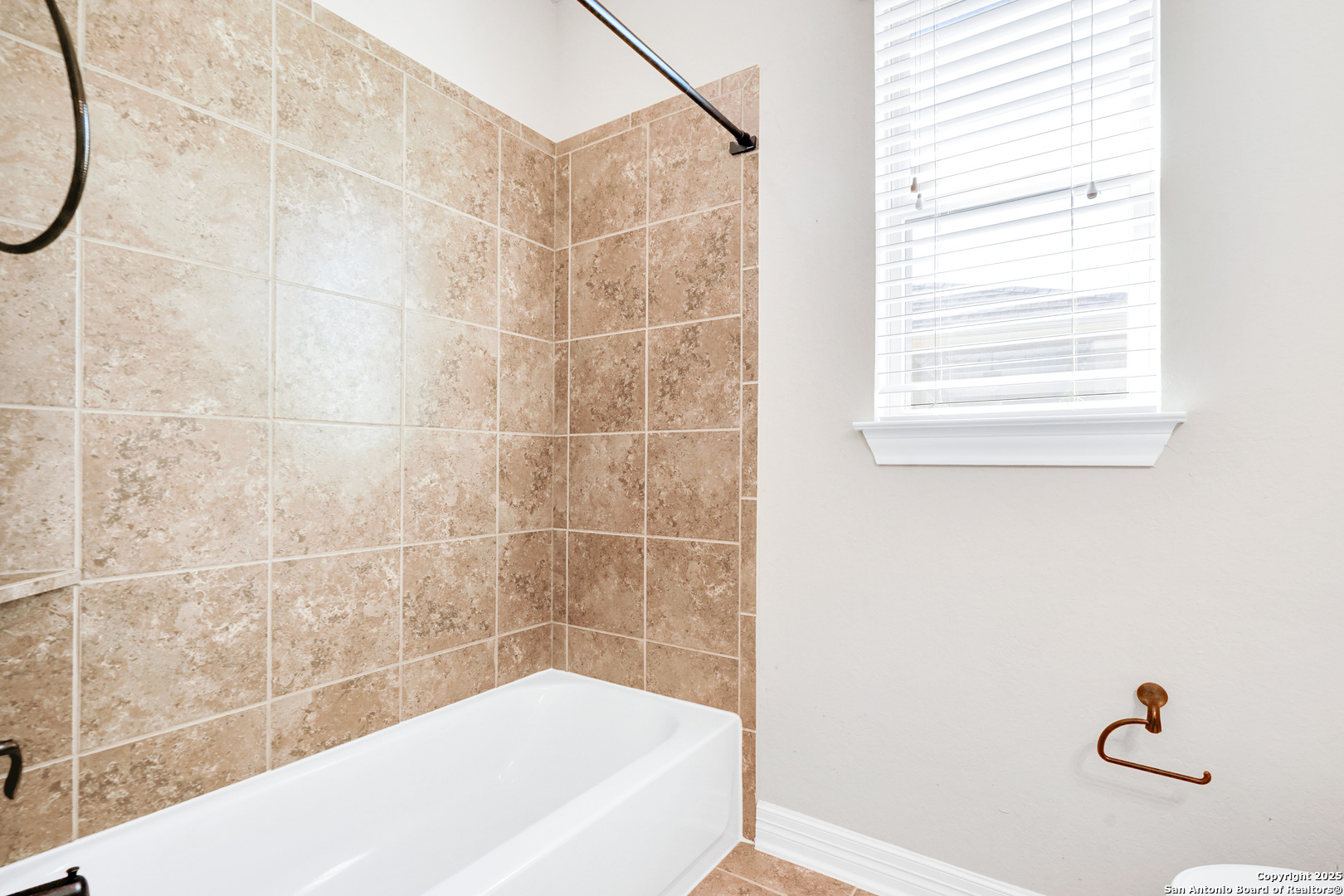 11923 Hollering Pass Schertz, TX 78154 - Photo 35 of 43 a bathroom with a bathtub and a shower