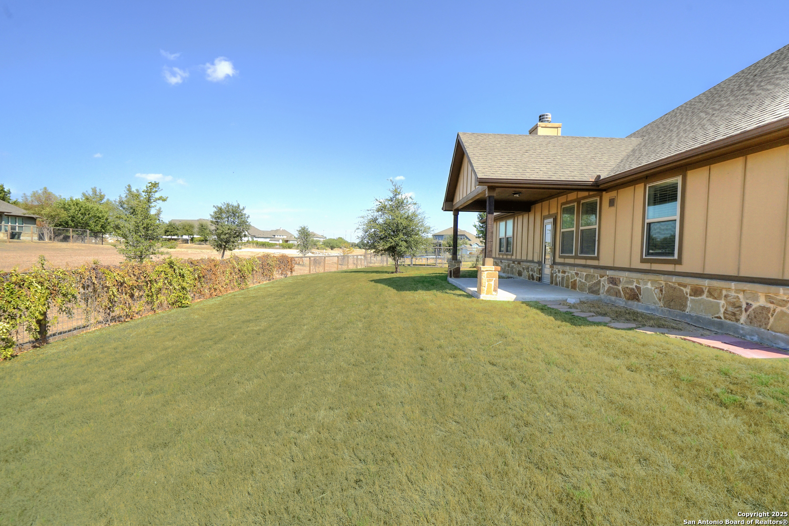 11923 Hollering Pass Schertz, TX 78154 - Photo 40 of 43 a view of a house with a ocean view