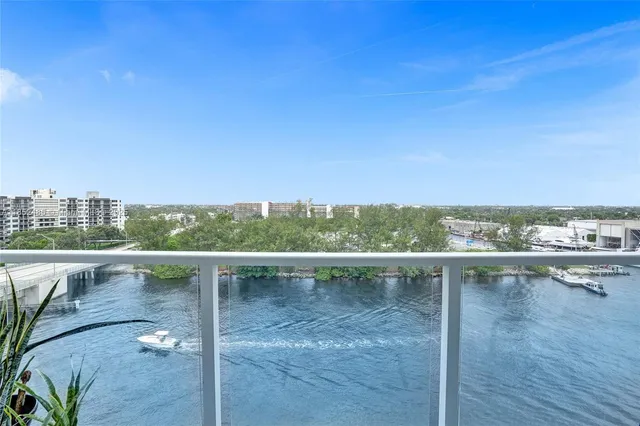 a view of swimming pool with outdoor space and seating area