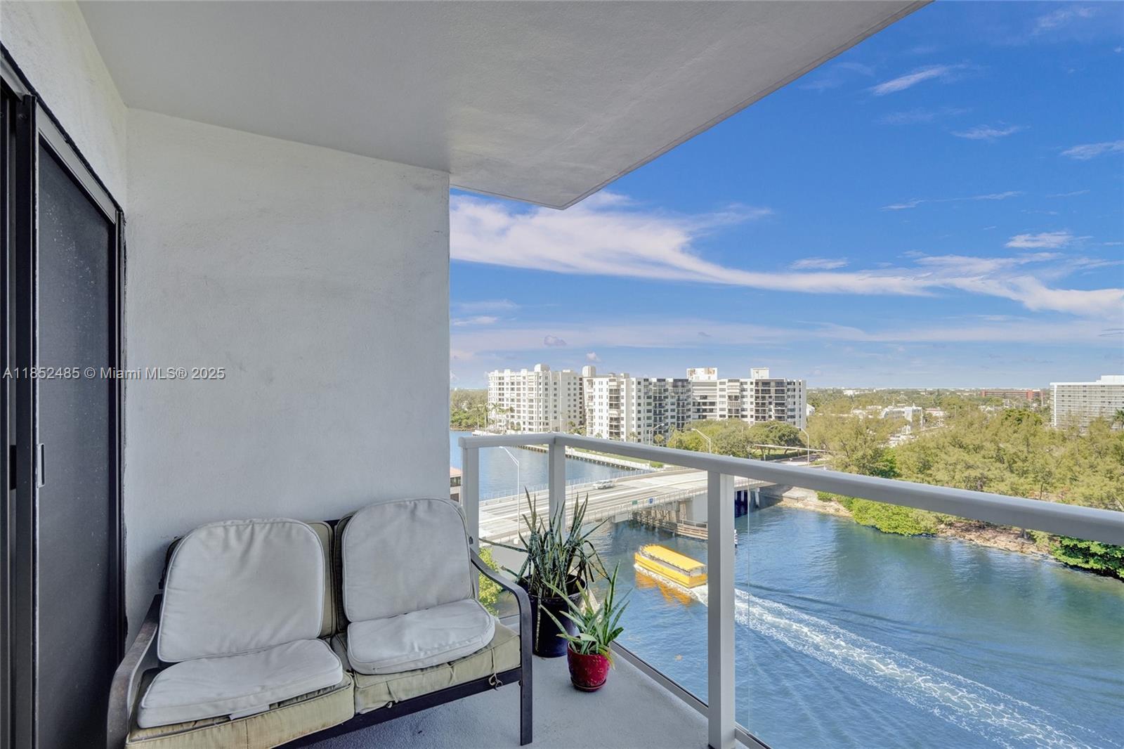 1401 North Riverside Drive, Unit 1005 Pompano Beach, FL 33062 - Photo 34 of 49 a view of a balcony with furniture