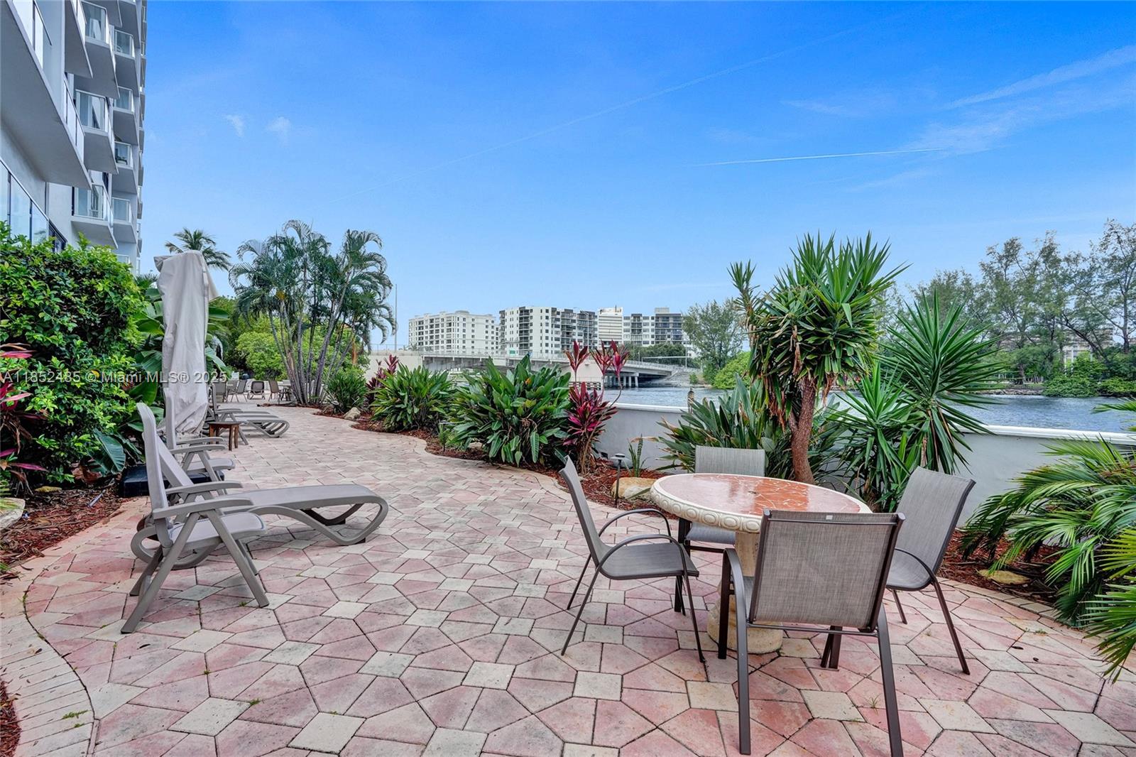 1401 North Riverside Drive, Unit 1005 Pompano Beach, FL 33062 - Photo 43 of 49 a view of a backyard with sitting area