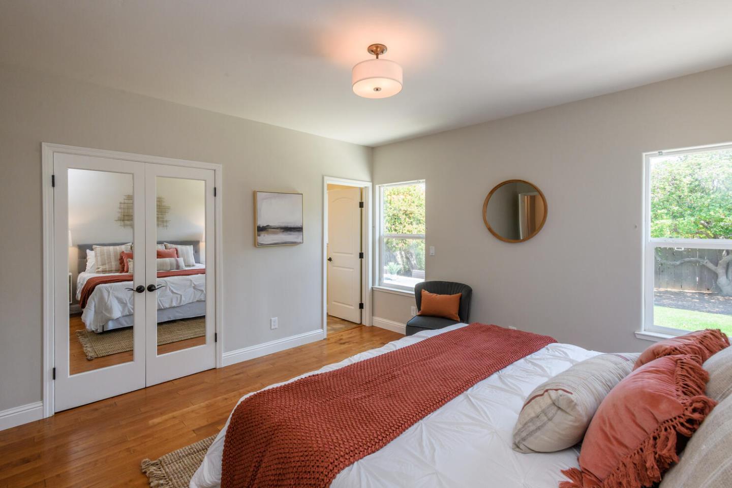 138 Channing Road Burlingame, CA 94010 - Photo 20 of 36 a bedroom with a bed and a large mirror